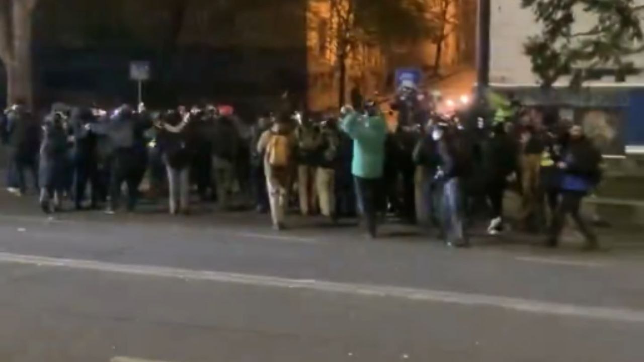 Water cannons deployed by police amid tense pro...