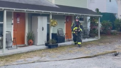 Dramatic footage captures first responders tackling a roof fire in Orlando