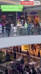 AVM'de para dağıtan yaşlı adam, izdihama neden oldu