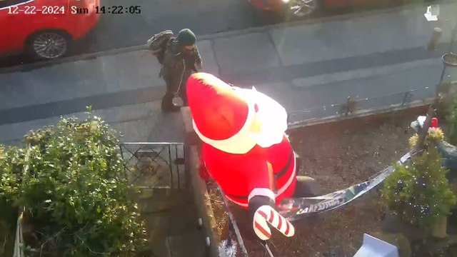 Police hunting real-life Grinch who stabbed and deflated giant inflatable Santa