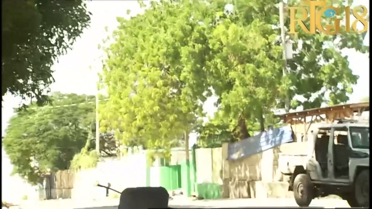 2 jounalis ak yon polisye mouri nan atak nèg ak zam nan Lopital Jeneral