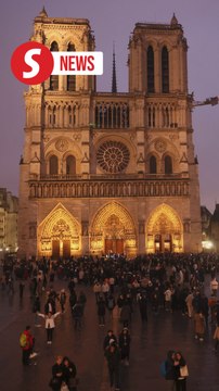 Huge crowds throng newly restored Notre-Dame cathedral for Christmas Eve mass