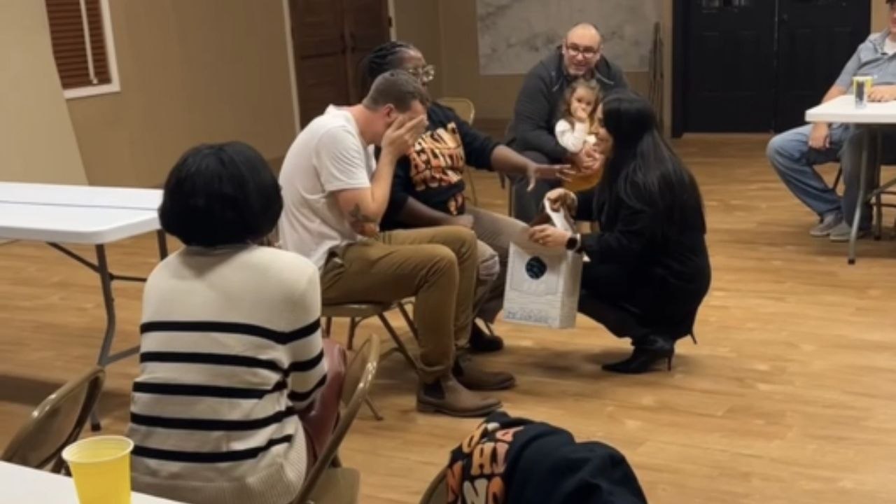 Parents-to-be customize a bear at Build-A-Bear Workshop to reveal their baby’s gender