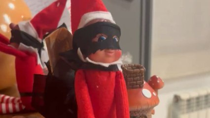 Mischievous elves caught in the act of stealing from the piggy bank