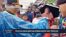 Polisi Distribusi Makanan Siap Saji Untuk Warga Terisolir Akibat Banjir