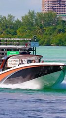 Gorgeous carbon fiber style cigarette racing boat at the Haulover Inlet