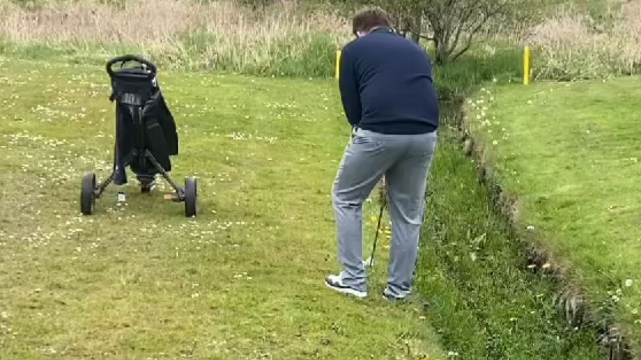 'Best Golf Shot to Grace this Earth!' - Man's face comically becomes a magnet for golf ball