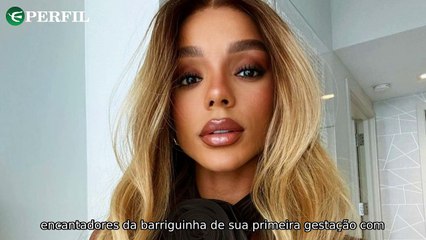 "Mamães famosas: Barrigão na praia, corpão natural e filha vidrada em cantora!"