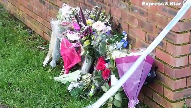 Fresh floral tributes at the scene of the murder of Louis Price in Elm Road, Norton Canes near Cannock, Mid-Staffordshire