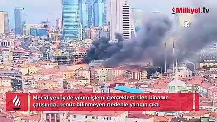 Şişli'de yıkım işlemi yapılan binada çıkan yangına müdahale ediliyor