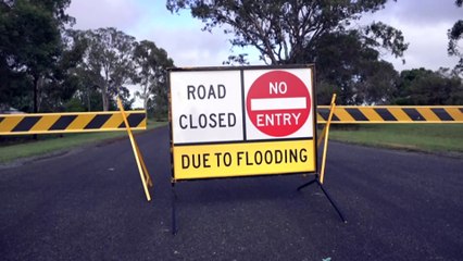 Residents in Queensland’s South Burnett region clean up after heavy rain