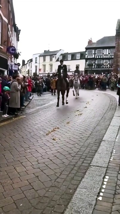 Ross Harriers ride out in front of Ross-on-Wye's Market House on Boxing Day