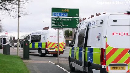 Police at the scene of the alleged stabbing at the junction of Field Road and Birmingham Road, Dudley.