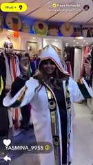 هيا الشعيبي بعباية يتصدرها صورة ولي العهد السعودي