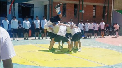 Attempted leap over group ends with a painful fall during bold stunt