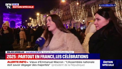 Nouvel an: sur les Champs-Élysées à Paris l'ambiance se réchauffe à l'approche du feu d'artifice