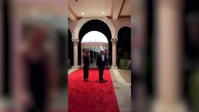 Donald Trump and wife Melania walk Mar-a-Lago red carpet at New Year’s Eve party
