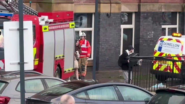 Fire brigade prepare to rescue flooded residents as Stockport hit by deluge