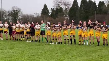 Minute's applause during the North Tawton RFC memorial game (Alan Quick, Crediton Courier)