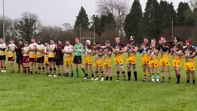 Minute's applause during the North Tawton RFC memorial game (Alan Quick, Crediton Courier)