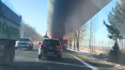 Vehicle narrowly avoids getting hit by wind turbine blade during transport