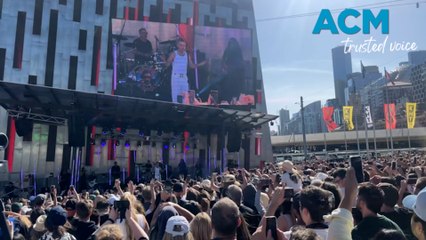 Robbie Williams sells his 'very sexy movie' at free gig