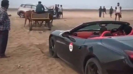VIDEO: 350 000 dollarin Ferrari juuttui hiekkaan ja pelastettiin härkäkärryllä