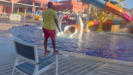 Girl excited to test new phone case slips unexpectedly near the poolside edge