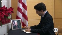 Canadian PM Trudean signs Condolence book honoring Jimmy Carter.