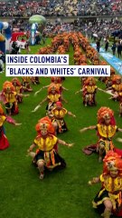 Revelers perform at "Blacks and Whites" carnival in Colombia
