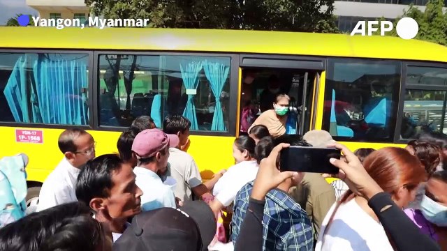 Relatives of inmates wait outside prisons for Myanmar's independence day amnesty