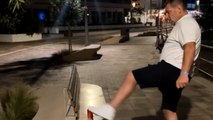 Girl challenges her drunk dad to kick a can after their fun night in Ibiza