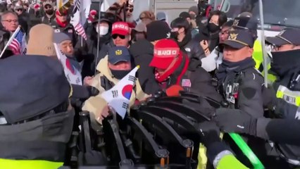 Impeached South Korean president holes up at home as arrest deadline approaches