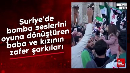 Suriye'de bomba seslerini oyuna dönüştüren baba ve kızının zafer şarkıları