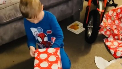Kid engulfed in contagious happiness after his Christmas surprise turns out to be a PS5