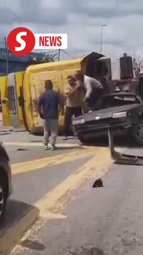 Four injured in Kuala Selangor after palm oil tanker hits two vehicles, catches fire