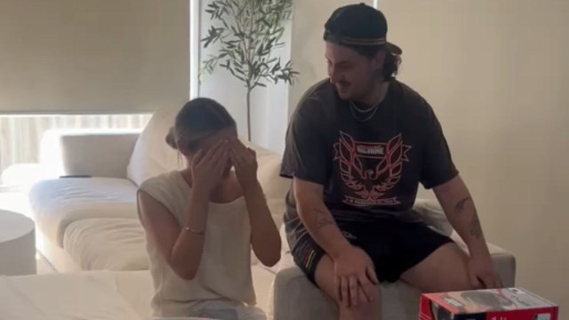 Family surprises woman with an adorable new puppy on Christmas morning