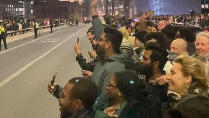 People gather at London Bridge to welcome the New Year with fireworks