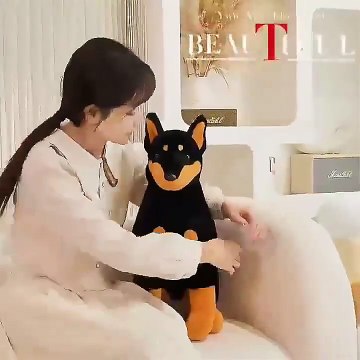 Classic soft plush simulation sitting doberman pinscher dog doll toy.