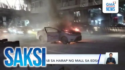 Taxi, nagliyab sa harap ng mall sa EDSA | Saksi