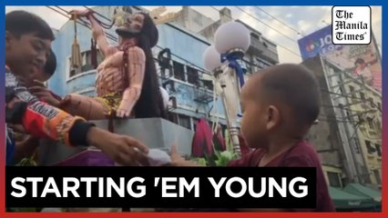 Children join celebration of Feast of Black Nazarene