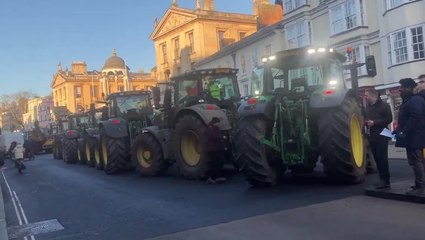 Angry farmers disrupt environment minister’s speech with loud tractor tax protest in Oxford