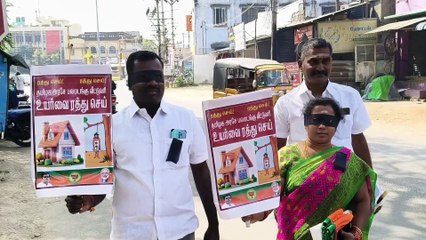 Bjp councillor protest with blindfolded