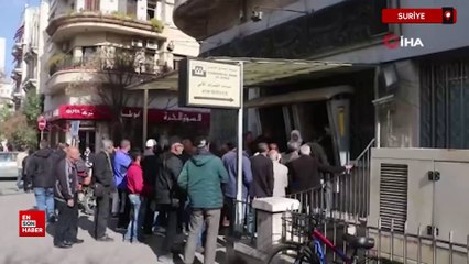 2 aylık maaşları hesaplarına yatan Suriyeliler ATM'lere akın ettiler