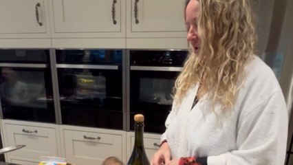 Christmas morning surprise: Cork hits mom’s cheek during Buck’s Fizz pop