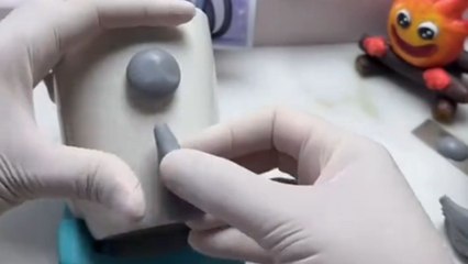 Amazing polymer clay artwork of a girl and her beloved cat on a mug