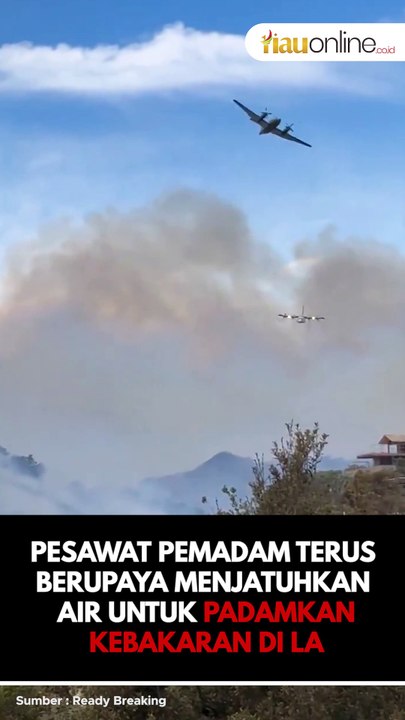 PESAWAT PEMADAM TERUS BERUPAYA MENJATUHKAN AIR UNTUK PADAMKAN KEBAKARAN DI LA
