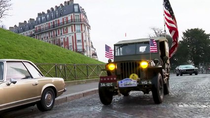 Vintage car enthusiasts take to the streets of Paris