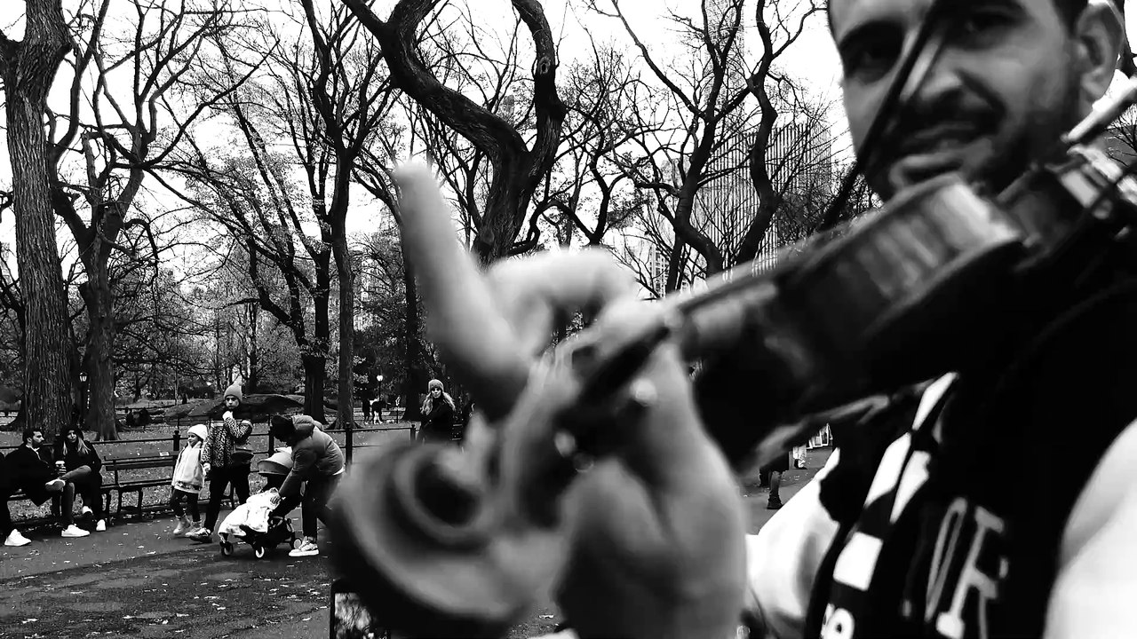 Raphael Batista electric violinist and DJ in Central Park New York City street music live
