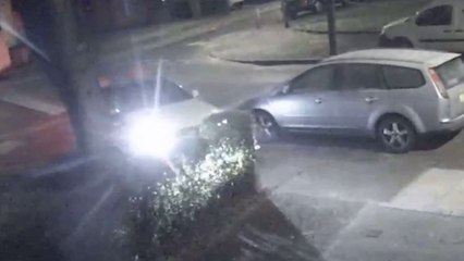 Watch as Mercedes driver crashes into parked car and tree - then just drives off